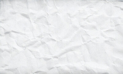 White recycled craft paper texture background with a rough, vintage feel. Grey paper with an old newspaper effect, creased grunge details, and a hardboard surface. Perfect for text, stationery.