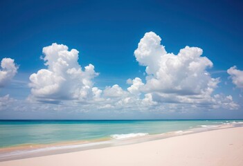 Fototapeta premium Fluffy white clouds drift above a pristine, sun-drenched sandy beach, weather, white