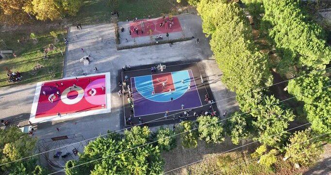 Aerial view of outdoor basketball court in urban park
