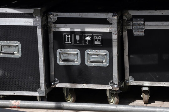 Drawers for transporting show material and setting up stages and technical work personnel. Empty space for texts and logos	
