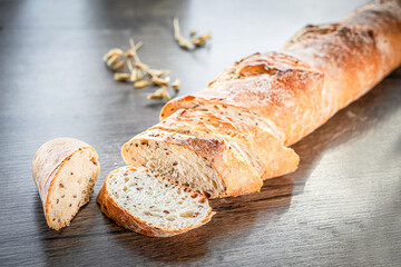 Craft sliced bread on the table at the bakery. The concept of small industries and healthy food
