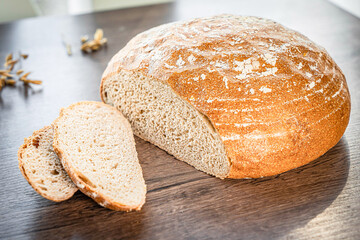Craft sliced bread on the table at the bakery. The concept of small industries and healthy food