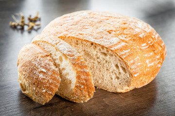 Craft sliced bread on the table at the bakery. The concept of small industries and healthy food