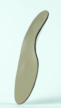 Orthopedic insole isolated on white background. Treatment and prevention of foot diseases