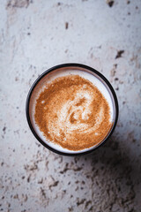 Kefir with cinnamon in brown glass. Drink for health and detox.