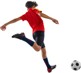 Rear view photo of junior soccer player running in motion to kicking ball, focused on victory against transparent background. Concept of sport, junior league, healthy lifestyle, championship.