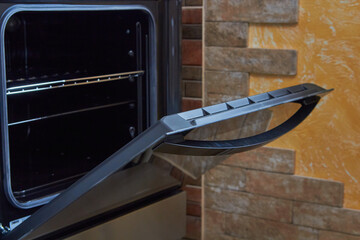 open oven, open gas oven door in kitchen, clean oven