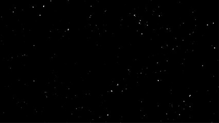 Snowflakes on a black background. Heavy snowfall, snowflakes in different shapes and forms. Winter. Snow background. Snowflakes isolated