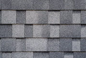 Gray asphalt roofing tiles, overlapped