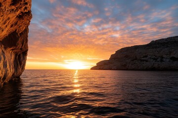 A breathtaking sunset illuminates the tranquil waters, casting vibrant colors over the cliffs and creating a perfect scene of nature's beauty and serenity at dusk.