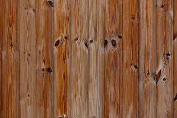 Fototapeta premium Warm tones of natural wood unveil the beauty of rustic craftsmanship in a serene outdoor setting at sunset