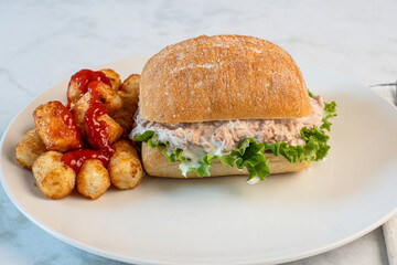 tuna salad sandwich  with tater tots