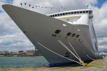 Classic cruiseship or cruise ship liner Neo Riviera in Piraeus Athens, Greece port on sunny day...