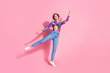 Full body portrait of pretty girl dancing empty space wear pullover isolated on pink color background