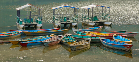 Brightly coloured boats on Lake Phewa the second largest lake in Nepal
