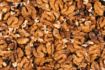 Walnut kernels isolated on white background. Walnuts close-up. Healthy eating. Half of walnut isolated. Peeled walnut on white.