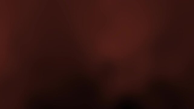 A smooth, abstract brown background with soft gradients, creating a warm and inviting atmosphere.