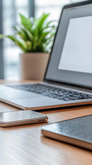 Close-up view of smartphone showing two-factor authentication code with laptop displaying secure login page in modern office setting