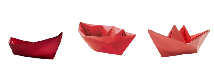 On a transparent background, a red origami boat is shown in isolation, a product of Generative Ai