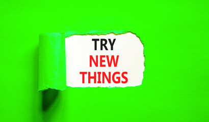 Try new things symbol. Concept words Try new things on beautiful white paper. Beautiful green paper background. Business motivational lifestyle try new things concept. Copy space.
