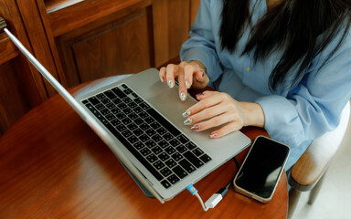 A female investor analyzes past trends, sets goals, diversifies assets, and manages risks to ensure...