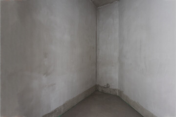 interior of the apartment without decoration in gray colors. rough finish