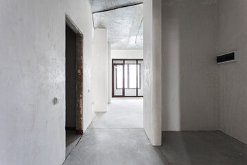 interior of the apartment without decoration in gray colors. rough finish