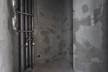 interior of the apartment without decoration in gray colors. rough finish