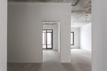 interior of the apartment without decoration in gray colors. rough finish