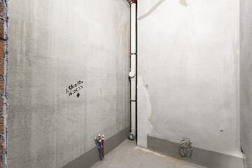 interior of the apartment without decoration in gray colors. rough finish