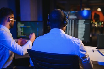 Happy Confident Technical Customer Support Specialist Having a Headset Call in a Monitoring and...
