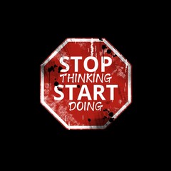 Stop thinking start doing text on traffic sign