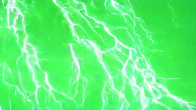 Abstract green background with lightning-like patterns, copy space