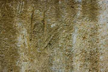 rough concrete wall with yellow stains - full-frame flat background and texture