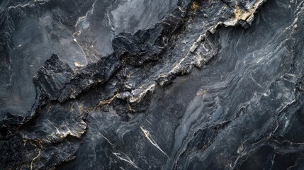 Naklejka premium Dark Gray And Gold Stone Texture Background