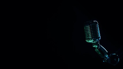 Studio microphone with dramatic blue lighting Retro Microphone with Red Lighting on Black Background