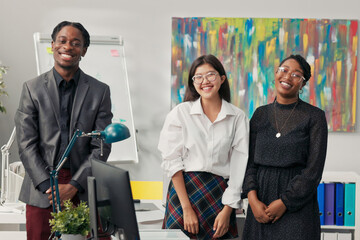 Happy, joyful, satisfied employees of corporations of different nationalities, skin color laugh,...