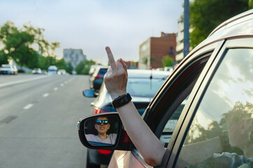 Road Rage Gesture with Hand Out Car Window