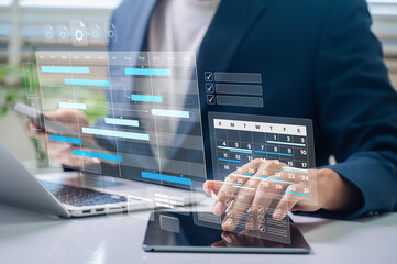 Project management and scheduling analytics. A professional using real-time progress tracking and...