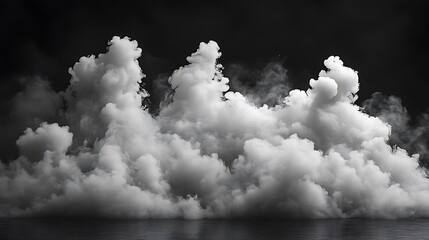 Dense white smoke billowing against a black background.