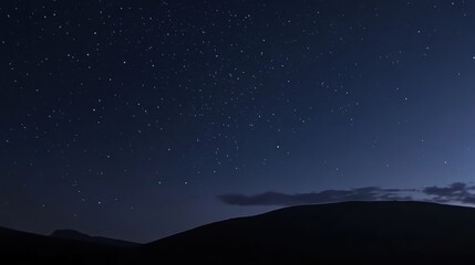 Stunning night landscape featuring the bright Milky Way galaxy over majestic mountains. A breathtaking starry sky perfect for nature, astronomy, and adventure themes.