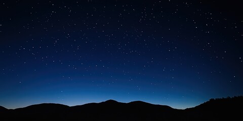Stunning night landscape featuring the bright Milky Way galaxy over majestic mountains. A breathtaking starry sky perfect for nature, astronomy, and adventure themes.