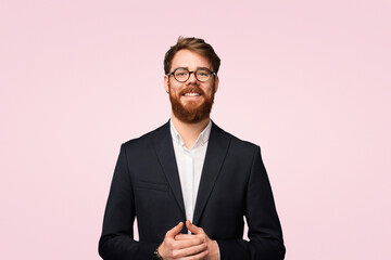 A cheerful professional man poses confidently, dressed in formal attire, presenting an approachable...