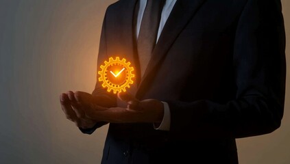 A businessman holding gears with a checkmark on his hand, a close-up photo of a businessman in a suit showing an icon of a mechanical system on a glowing screen, isolated over a white background.