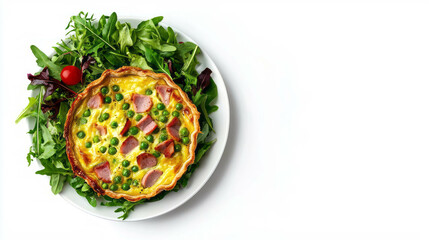 Delicious green pea and ham quiche on fresh salad for brunch or lunch