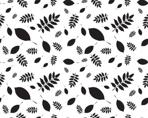 Seamless pattern with silhouettes of foliage on a white background