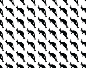 Seamless pattern with silhouettes of kangaroos on a white background