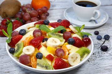fresh fruit salad on the rustic white wood meyve salatası