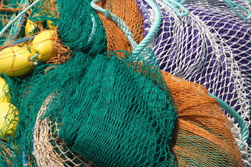 background of colorful fishing nets and floats