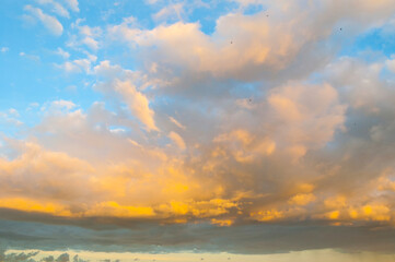 Picturesque sunset sky background, scenic sunset sky landscape panoramic scene, sky dramatic clouds